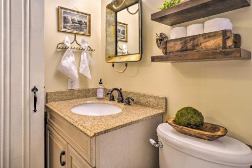 a bathroom with a sink and a toilet at Dreamy Homestead Escape Patio, Ranch On-Site in Crossville