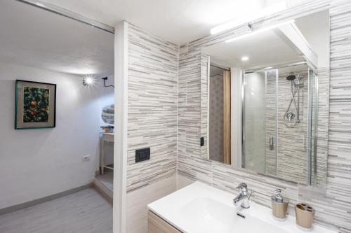 A bathroom at Casinò e Ariston Theatre studio apartment