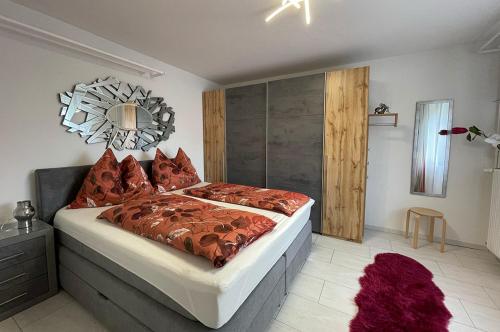 Кровать или кровати в номере Ferienwohnung Nina Ortner Greifenburg