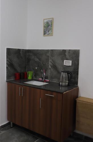 Cuina o zona de cuina de Eastside Suites