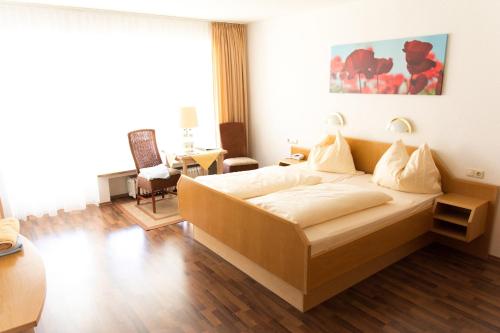 Ein Bett oder Betten in einem Zimmer der Unterkunft Kneipp-Bund Hotel Bad Wörishofen