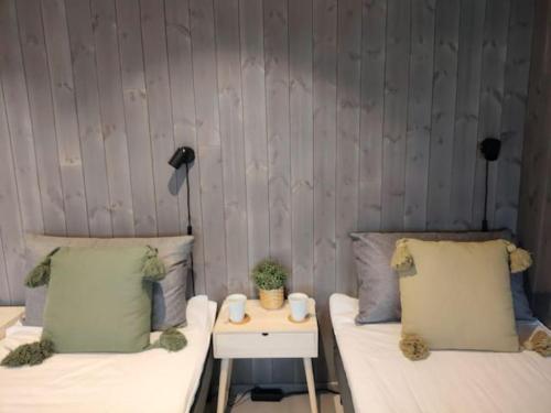 Llit o llits en una habitació de Leilighet i Banhammaren med balkong