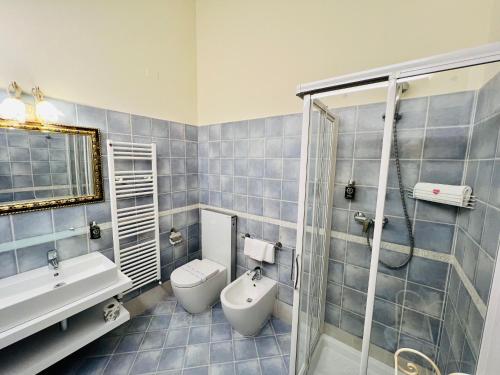 Ένα μπάνιο στο Bertoletta Village Apartments