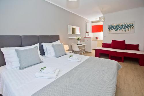A bed or beds in a room at Villa Milton Hvar