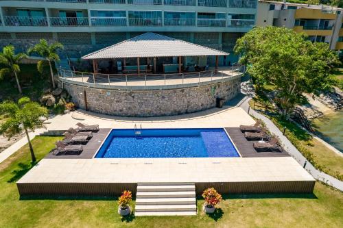 Πισίνα στο ή κοντά στο Conforto com vista para o mar!
