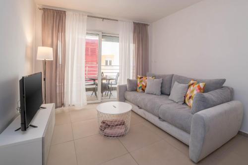TV a/nebo společenská místnost v ubytování Apartman Ella
