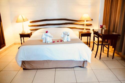 Ένα ή περισσότερα κρεβάτια σε δωμάτιο στο Hotel Sol de Ica