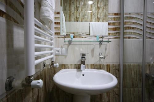 Ванная комната в Discovery Hotel