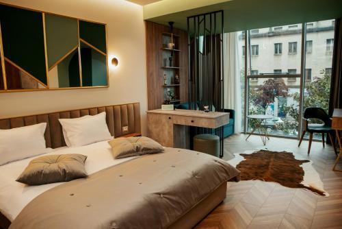 Katil atau katil-katil dalam bilik di Centropolis Apartments
