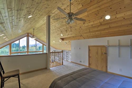 a bedroom with a bed and a ceiling fan at Idyllic Retreat about 20 Mi to Olympic National Park! in Port Angeles