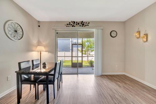an empty dining room with a table and chairs at ZenHomes in heart of Brandon convenient location in Brandon