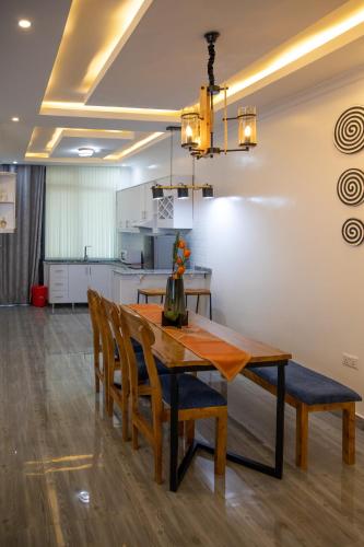 Кухня или мини-кухня в IKAZE APARTMENTS
