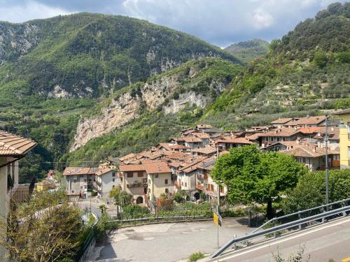 a village on the side of a mountain at Garda View Apartment in Tenno