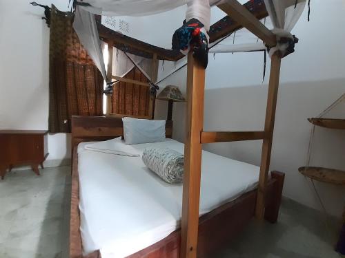Ένα ή περισσότερα κρεβάτια σε δωμάτιο στο The Belle View Inn Bed & Breakfast