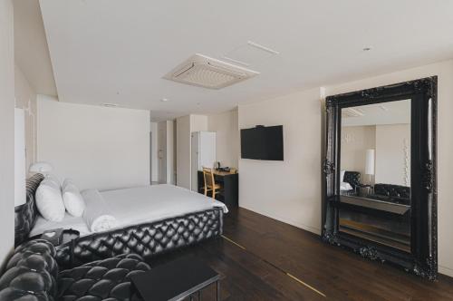 Postel nebo postele na pokoji v ubytování ACC Design Hotel