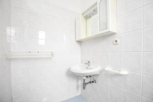 Ένα μπάνιο στο Apartments Studenac