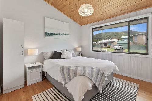 Postel nebo postele na pokoji v ubytování Shell Shack - BYO Linen