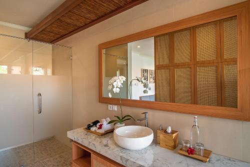 Koupelna v ubytování Budhi Ayu Villas and Cottages Ubud by Mahaputra-CHSE Certified