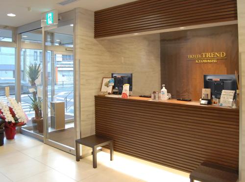 a restaurant with a checkout counter in a store at Hotel Trend Kyobashi Ekimae in Osaka