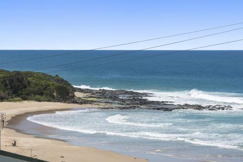 a view of a beach and the ocean at Il Mare The Ocean in Skenes Creek