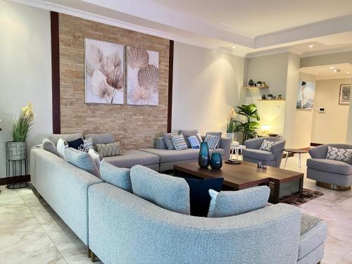 A seating area at Fairview Luxury Apartments