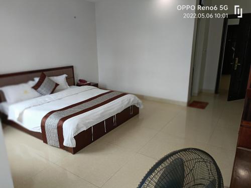 Ένα ή περισσότερα κρεβάτια σε δωμάτιο στο SONG HONG VIEW HOTEL