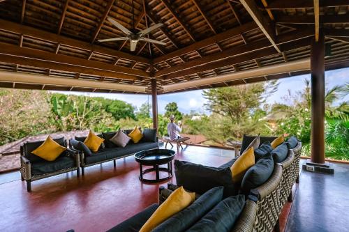 Χώρος καθιστικού στο VILLA Chacha VILLA Coco VILLA Salsa RESORT APOLLONIA