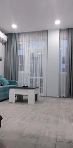 Zona de estar de apartament tea