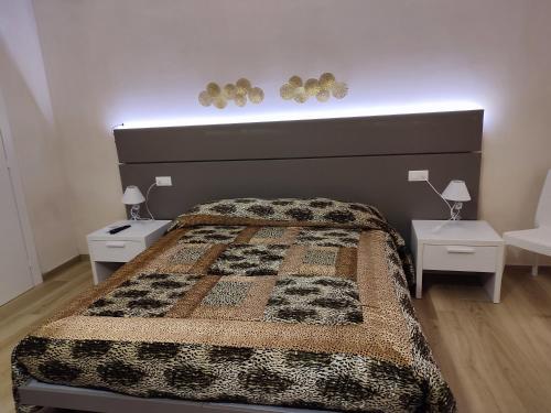 Postel nebo postele na pokoji v ubytování La maison del porto