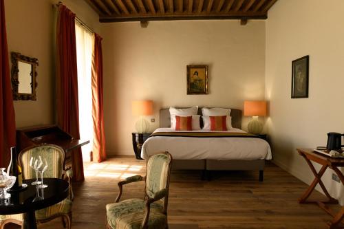 Ένα ή περισσότερα κρεβάτια σε δωμάτιο στο Château de Pymont