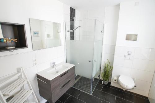 Ένα μπάνιο στο Ferienhaus 15 "Gut Tossens"