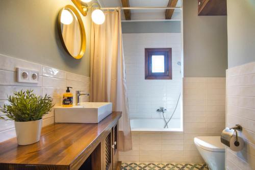 A bathroom at Casa Azul Stylish beach house for 4 adults and 1 child in Cala Llombards