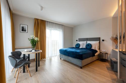 Ένα ή περισσότερα κρεβάτια σε δωμάτιο στο InPoint Apartments G11 near Old Town & Kazimierz District & Optional Paid Parking