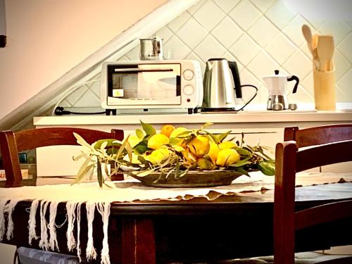 Gallery image of -- La Maisonette -- Casa Vacanze -- Nel centro storico a 30 mt dal Parco Aymerich, Museo Menhir, Casa di Sant'Ignazio - Holiday Home with Kitchen in Làconi