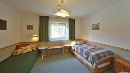 Postel nebo postele na pokoji v ubytování Cottages - Chalets Mag. Scholz