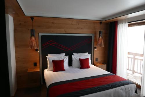Un ou plusieurs lits dans un hébergement de l'établissement Hôtel Alparena & Spa