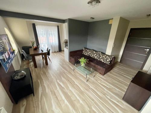 an overhead view of a living room with a couch at Baltic Sun SPA in Rewal