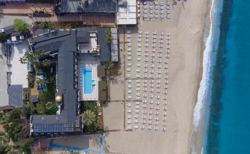 an aerial view of a hotel on the beach at Alaaddin Beach Hotel - Adult Only in Alanya