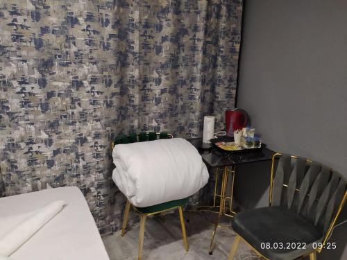 Postel nebo postele na pokoji v ubytování Eyüp Kral Small Suit