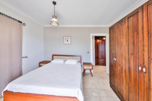 Ένα ή περισσότερα κρεβάτια σε δωμάτιο στο Nirvana Apartments