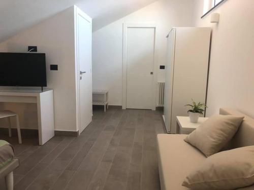 TV a/nebo společenská místnost v ubytování Farau B&B
