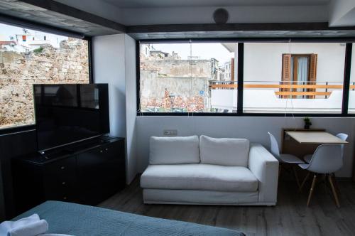 Телевизор и/или развлекательный центр в Kastren Rooms