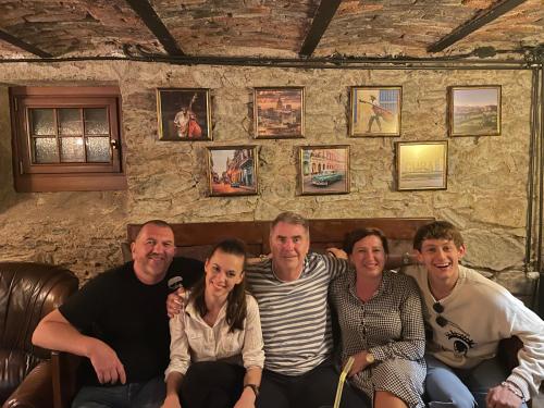 a group of people sitting on a couch at VILLA ANGEL in Rožňava