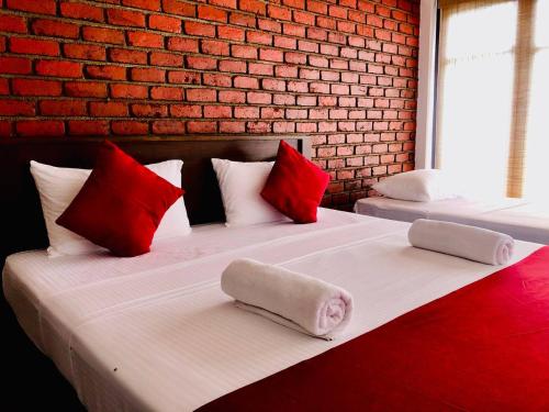 Posteľ alebo postele v izbe v ubytovaní Lolu Village Resort
