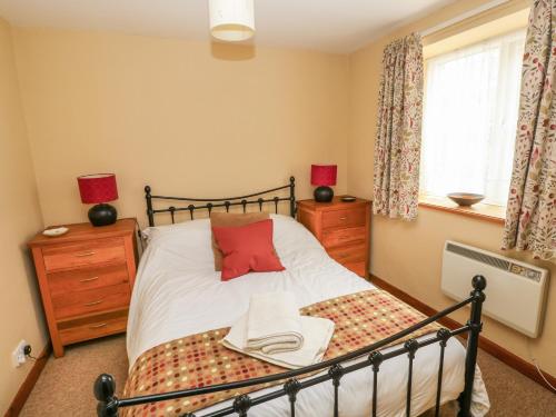 Ліжко або ліжка в номері Mincorn Cottage
