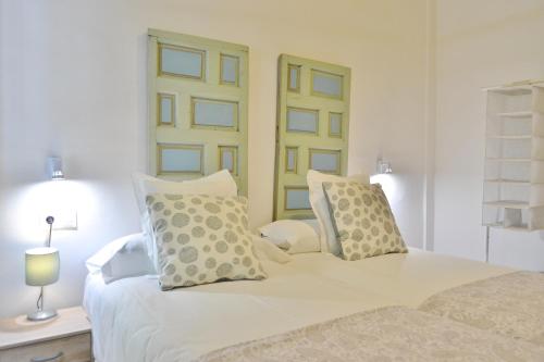 Llit o llits en una habitació de SunShine Cordoba Central