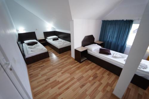 Un pat sau paturi într-o cameră la Complex Marinn Costinesti