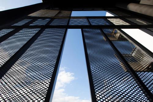 a view from the bottom of a tall building at Thisean Modern Suites By Athens Stay in Athens