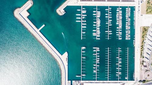 an aerial view of a marina next to the water at Marina del Gargano Houseboat in Manfredonia