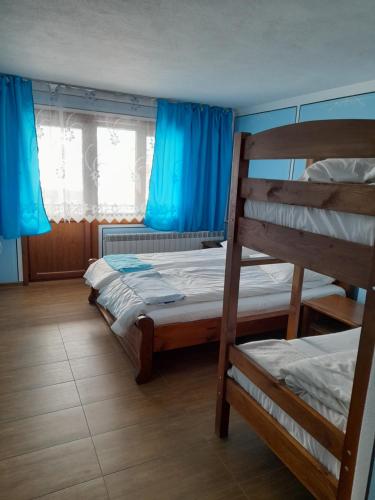 Postel nebo postele na pokoji v ubytování Къща Ради